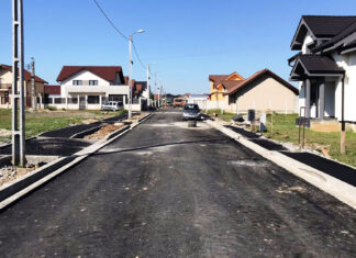 S-a turnat primul strat de asfalt pe strada Corneliu Zdrehuș
